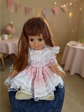This is a vintage 1972/73 Ideal Baby Crissy doll with iconic "Gro-Hair"